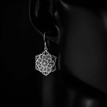 Sterling Silver Lotus Earrings on model - Black Feather Design